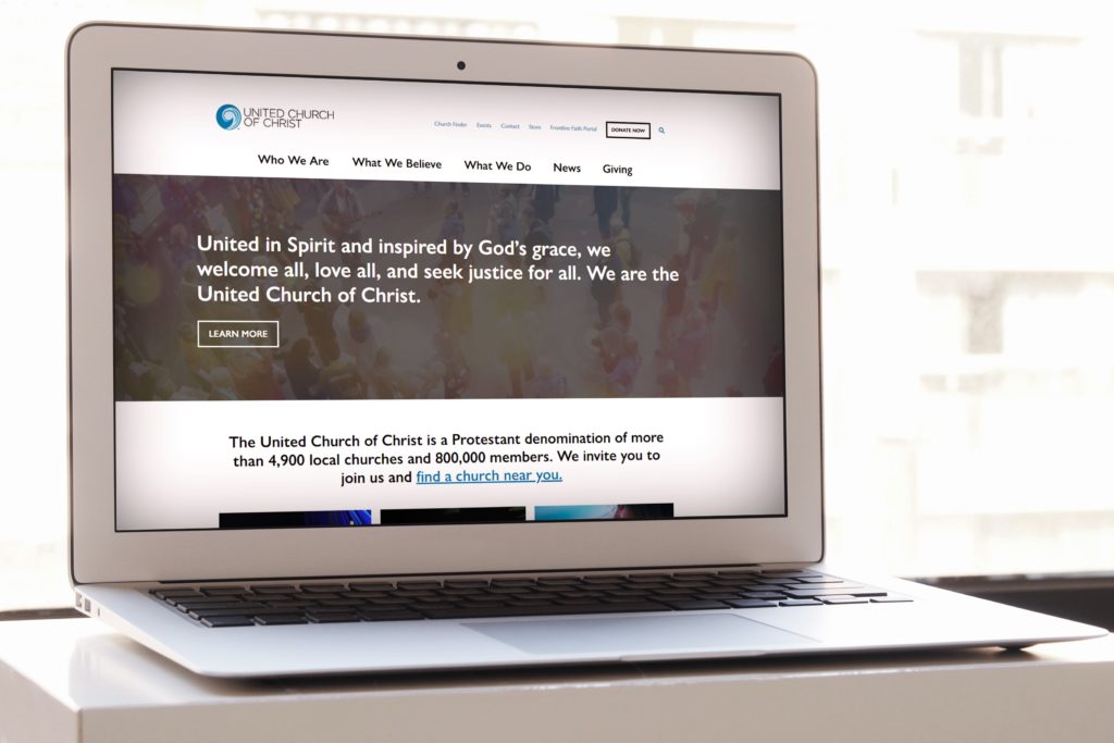Redesigned UCC website on computer screen December 2021