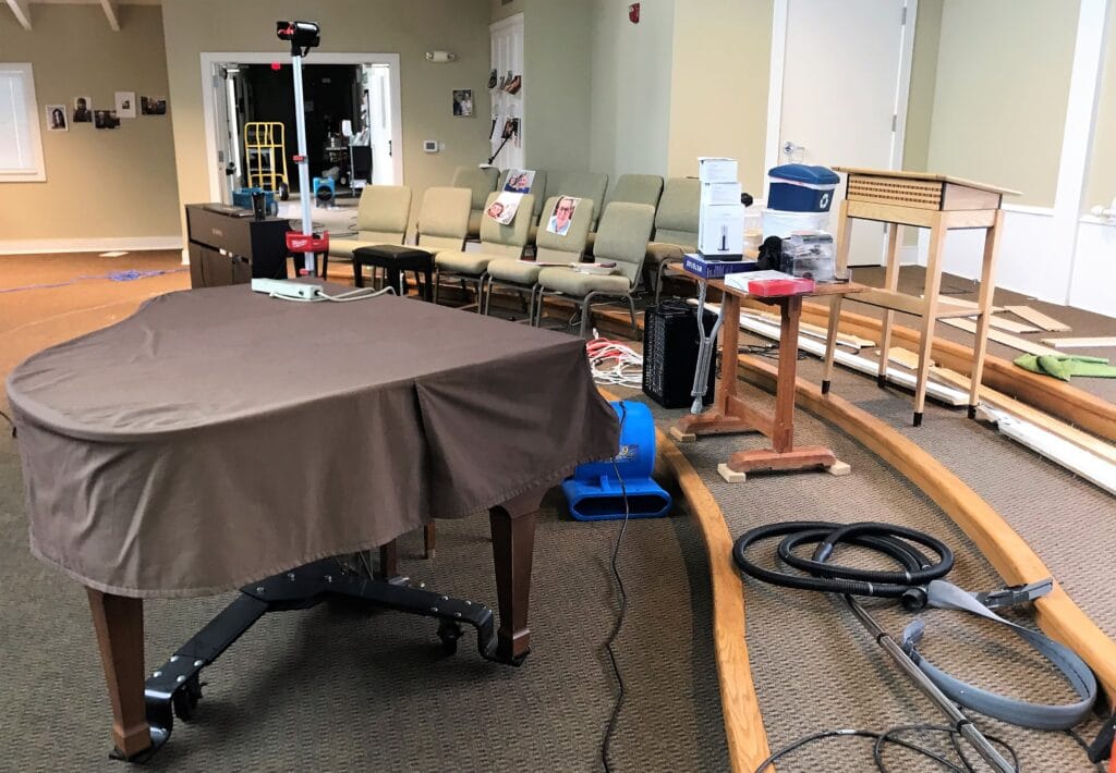 Cleanup operation in sanctuary of Friends Congregational UCC, College Station, Tex., after storm damage.