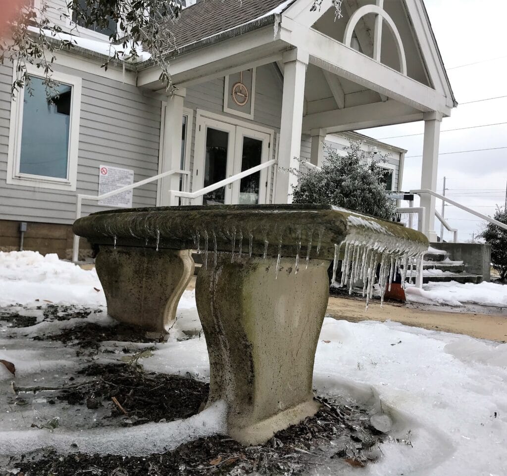 Icy bench outside Friends Congregational UCC, College Station, Tex., Feb. 2021