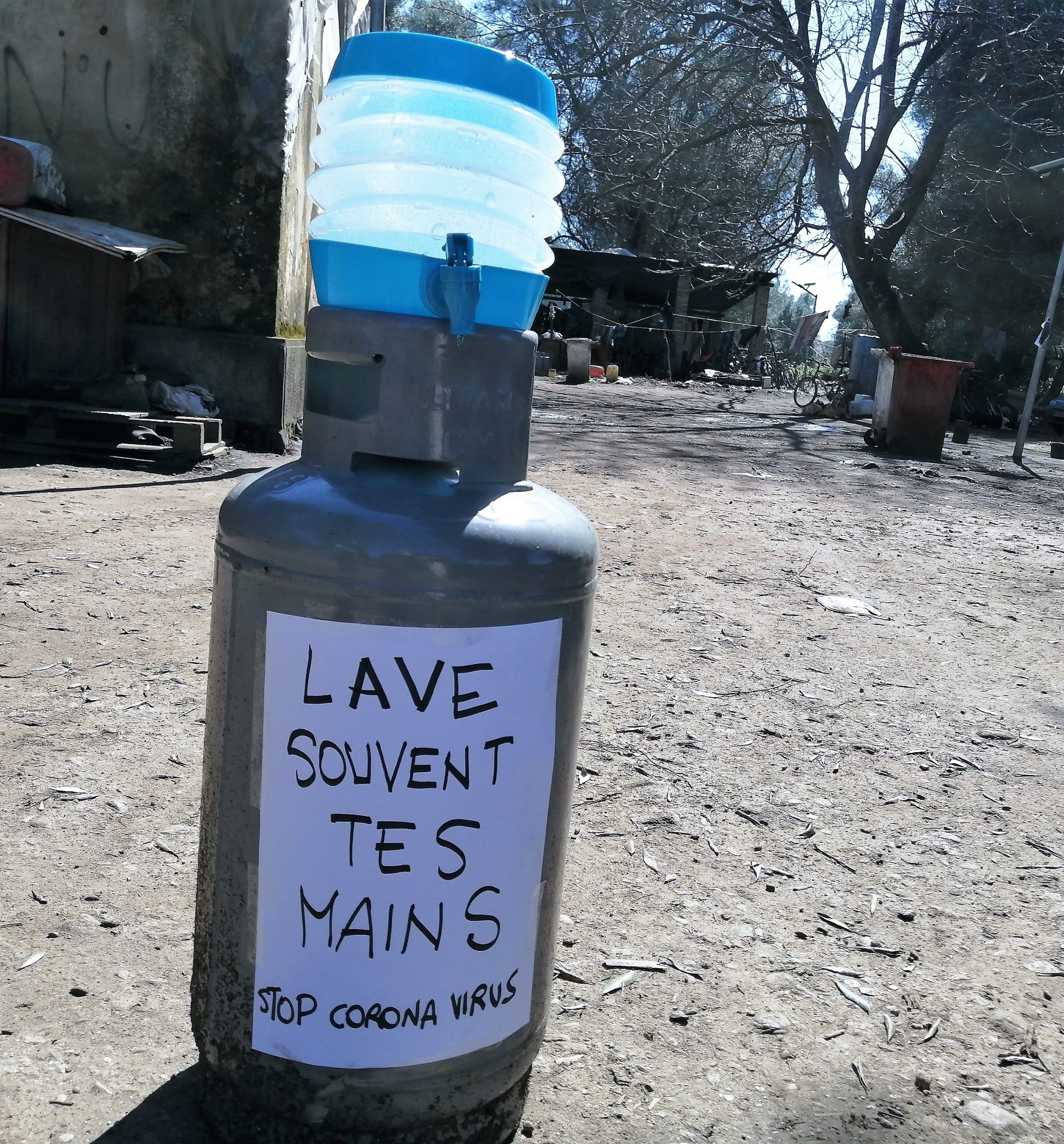 Hand-washing station, refugee camp, Italy