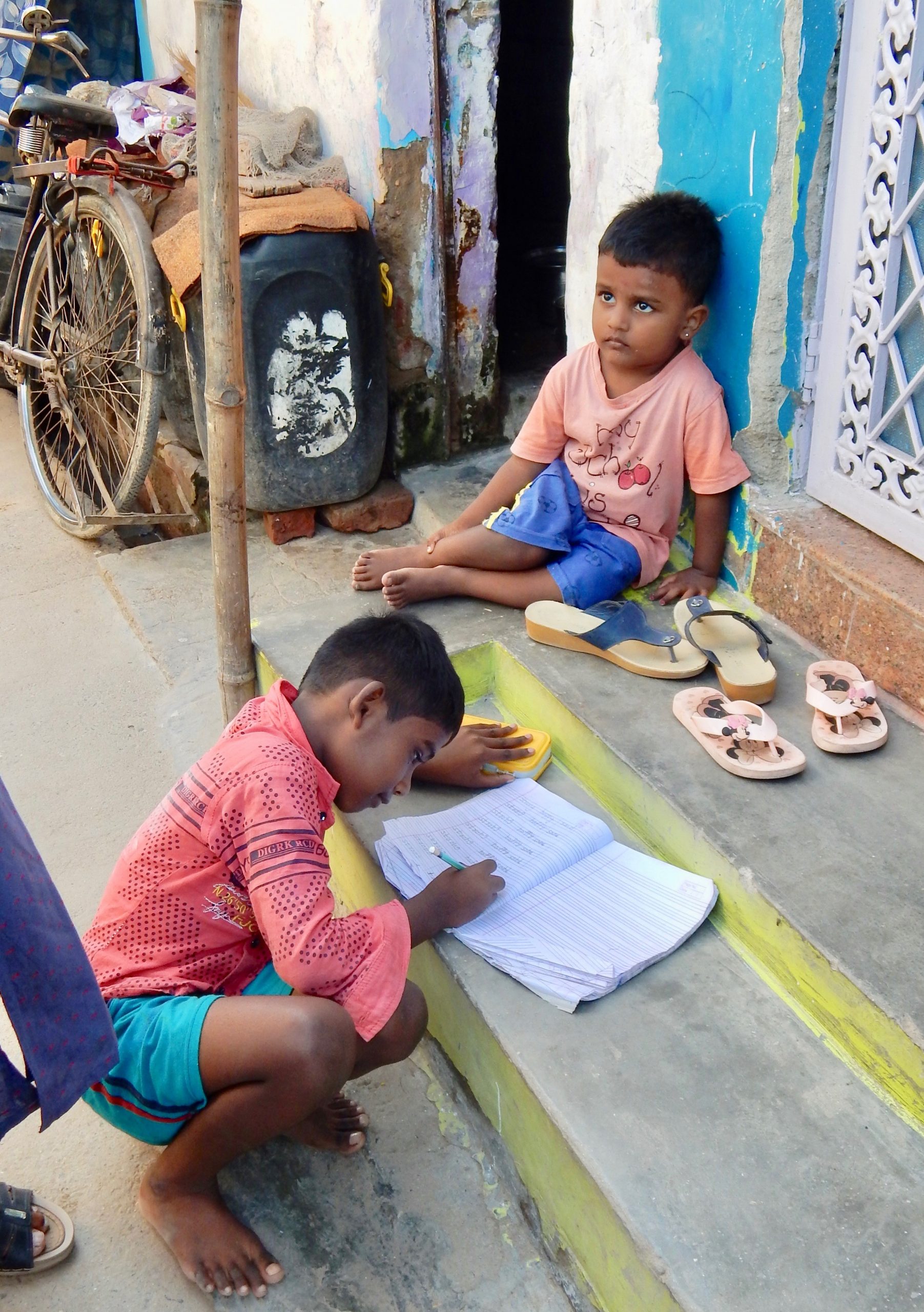 Two children in New Delhi slum community 2019