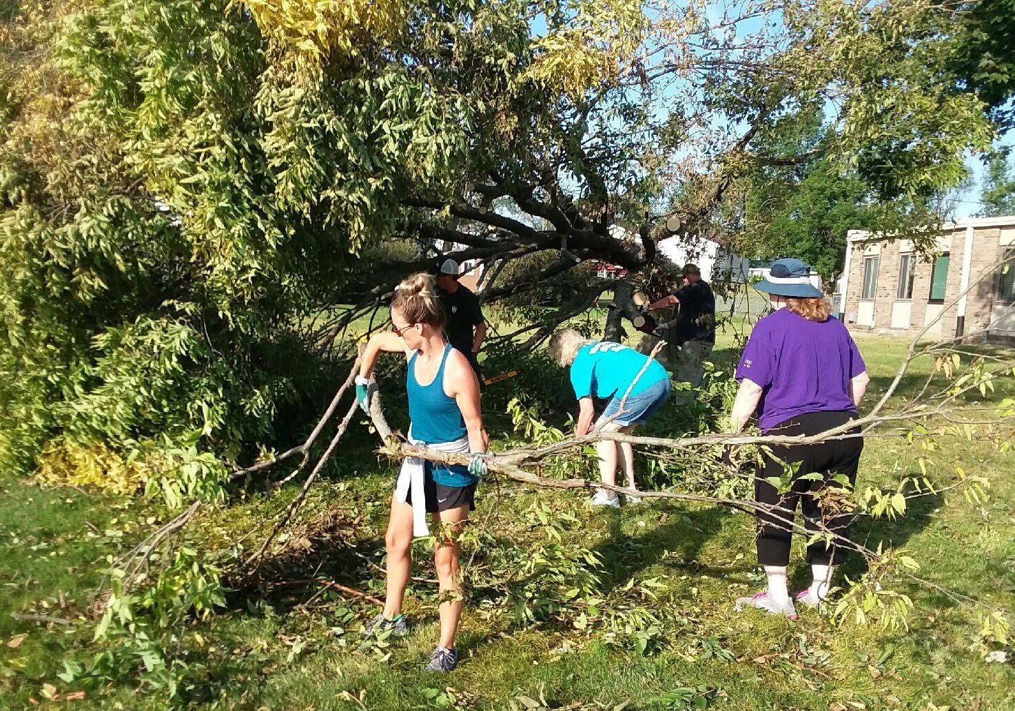 Hope UCC members clear fallen tree, Aug. 2020