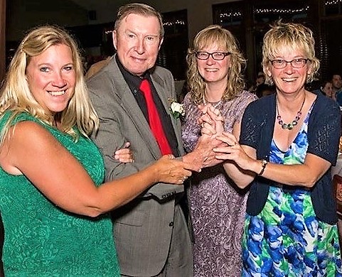 Ralph Quellhorst and his three daughters