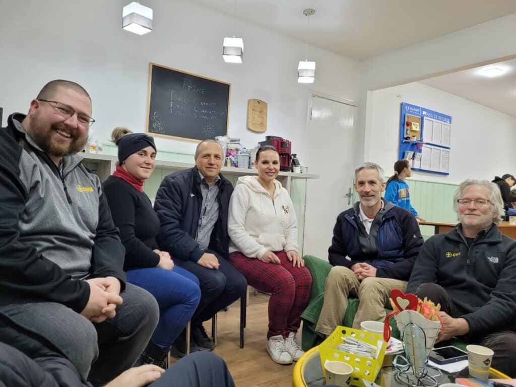 Andrew Blakely (CWS Moldova Team Leader), Nastya* (Ukrainian refugee), Alexander and Aneta (founders & directors of Diamant), Josh Baird (UCC Global H.O.P.E. Team Leader), and Steve Weaver (CWS Regional Director for Europe and the Middle East)