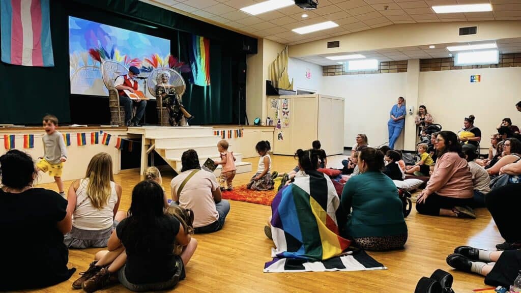 Drag queens read to crowd in church auditorium