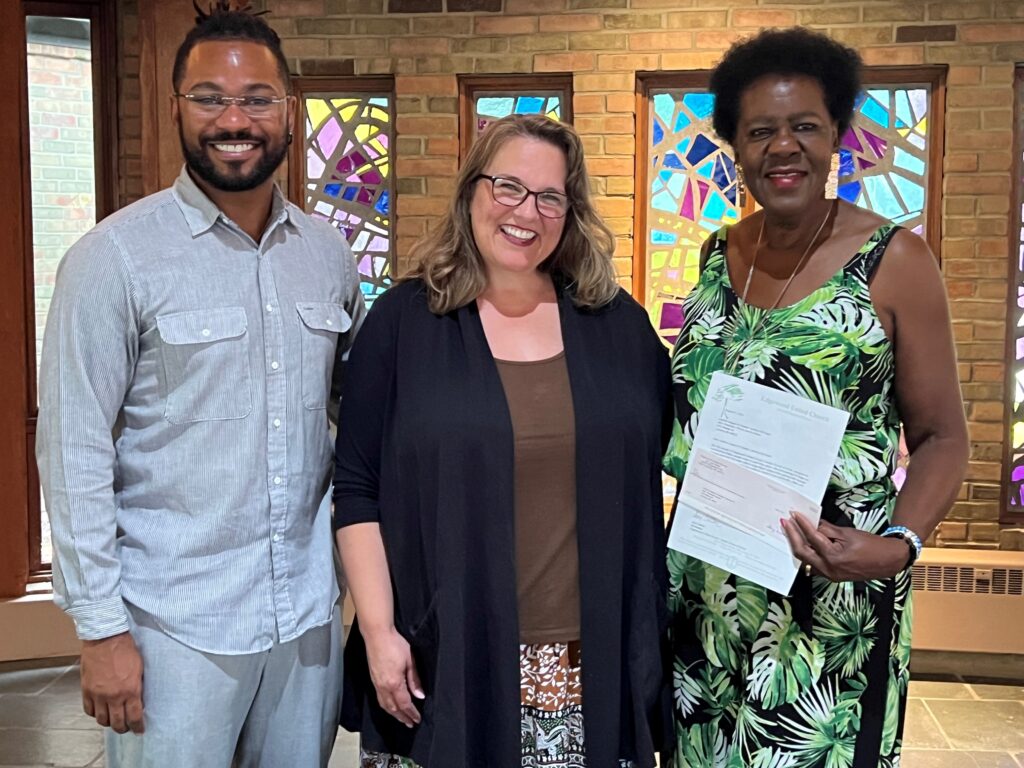 Edgewood United Church delivers check for reparations.